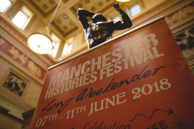 Orange banner of Manchester Histories Festival 2019