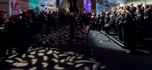 image of choir sining in a venue in Manchester - all women