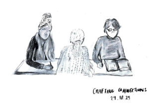 Black & White line drawing of three women sat a round a table